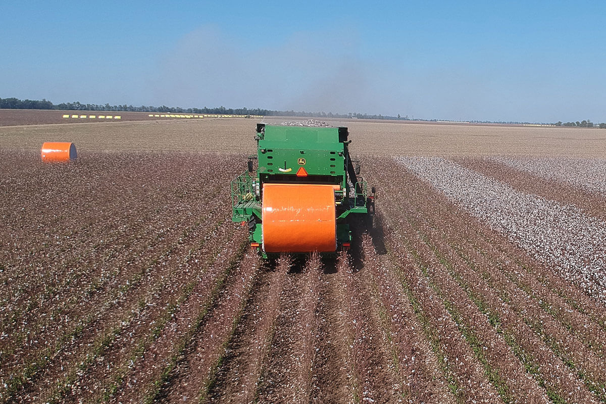 Picksmart Cotton Wrap by SMA being used by a green baler